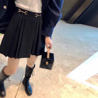 エイチアンドエム(H&M)のクロスリング　黒金色スカート 制服　やみかわ 韓国　量産系　vintage 渋谷(ひざ丈スカート)