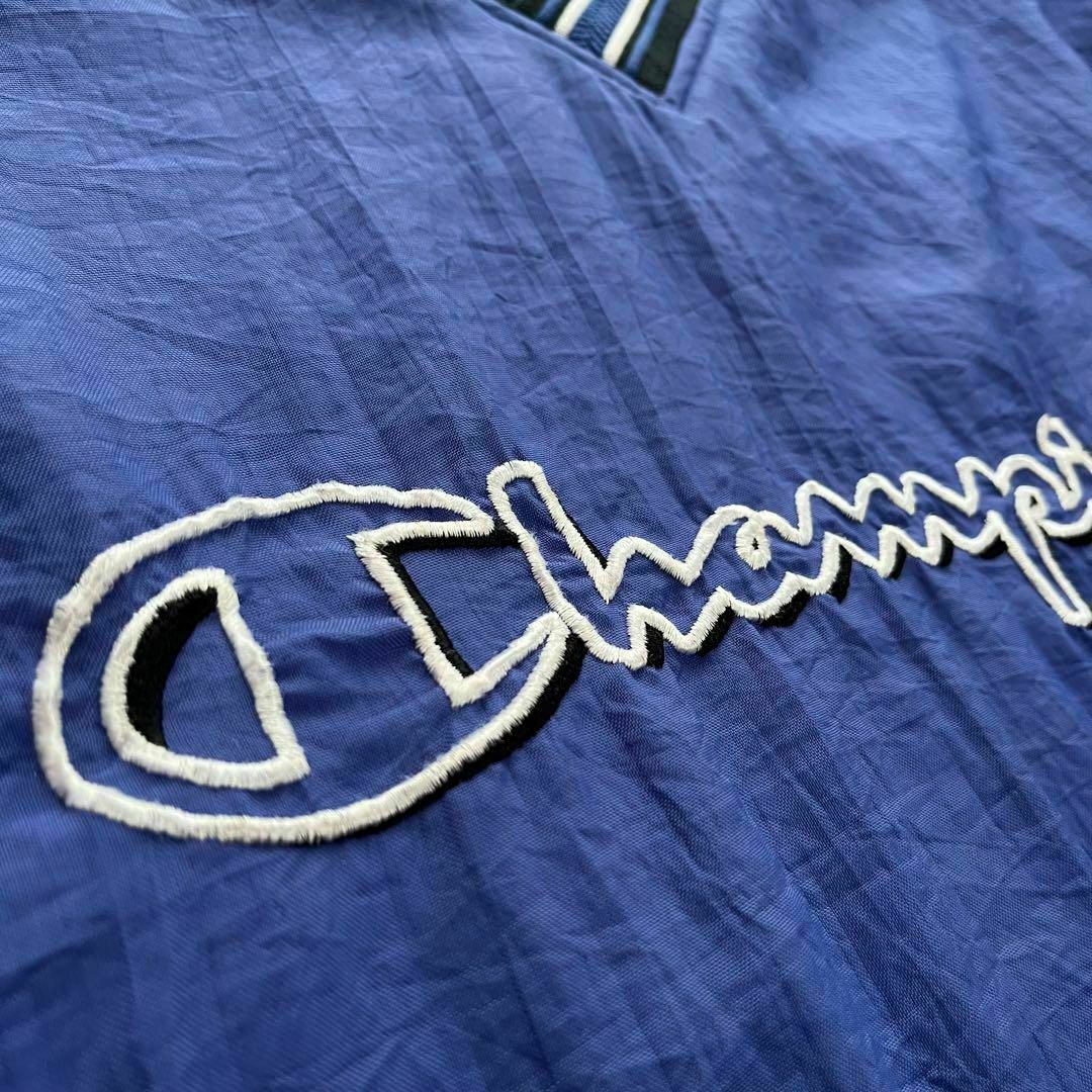 Champion(チャンピオン)のチャンピオン　ナイロンプルオーバージャケット　　ゲームシャツ　XLサイズ　ブルー メンズのジャケット/アウター(ナイロンジャケット)の商品写真
