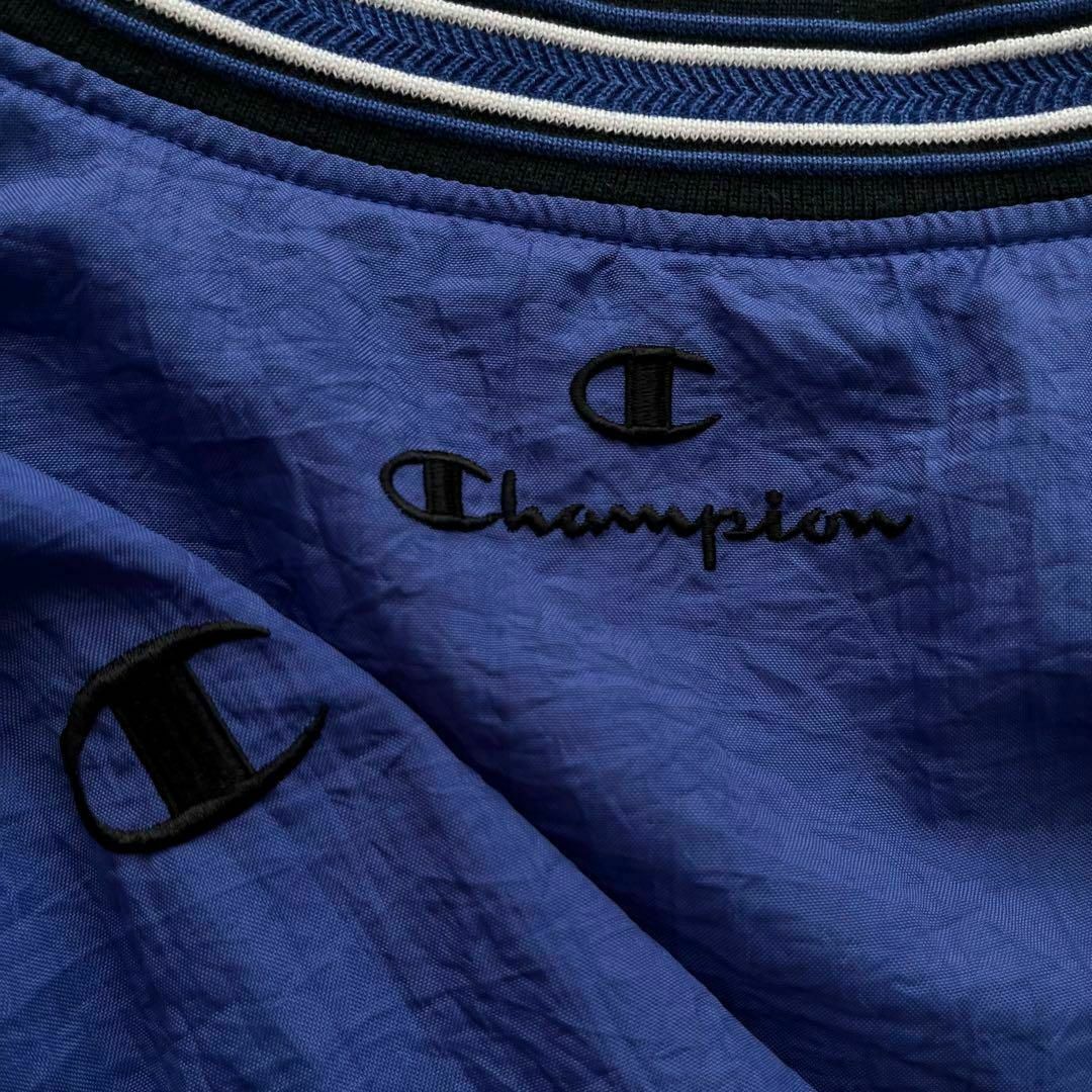 Champion(チャンピオン)のチャンピオン　ナイロンプルオーバージャケット　　ゲームシャツ　XLサイズ　ブルー メンズのジャケット/アウター(ナイロンジャケット)の商品写真