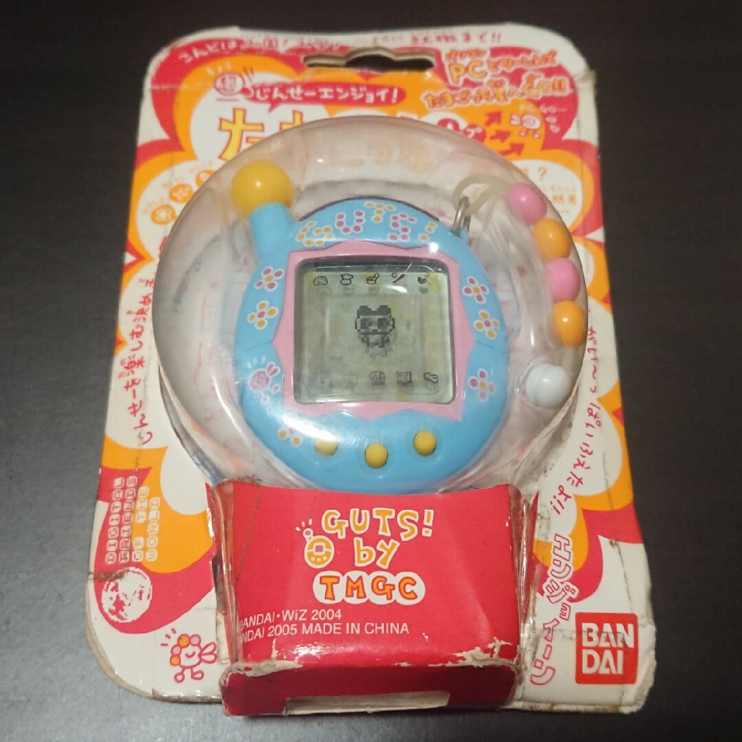 BANDAI(バンダイ)の【未開封品】じんせーエンジョイ！たまごっちプラス ガッツぶるー BANDAI エンタメ/ホビーのゲームソフト/ゲーム機本体(携帯用ゲーム機本体)の商品写真