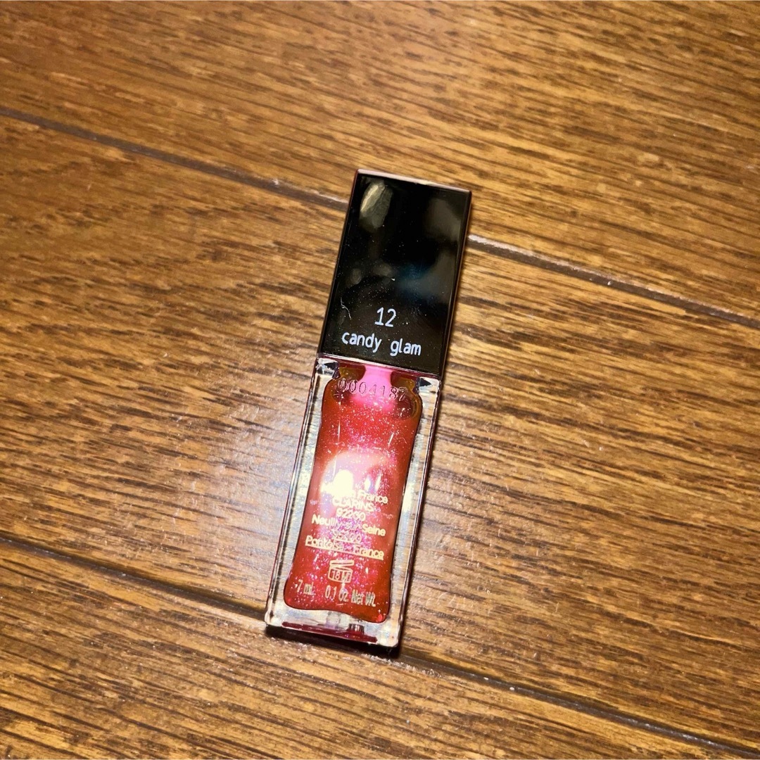 CLARINS(クラランス)のCLARINS Lip Comfort Oil 12 Candy Glam コスメ/美容のベースメイク/化粧品(リップグロス)の商品写真