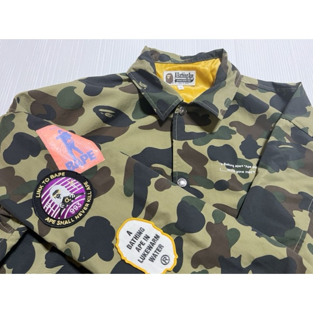 A BATHING APE(アベイシングエイプ)のA BATHING APE(アベイシングエイプ) 001LJE301019X 1ST CAMO RELAXED COACH JACKET カモフラ コーチジャケット【A31299-007】 メンズのジャケット/アウター(ナイロンジャケット)の商品写真