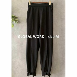 グローバルワーク(GLOBAL WORK)のGLOBAL WORK 黒ゴムパンツ ストレッチ スリット(カジュアルパンツ)