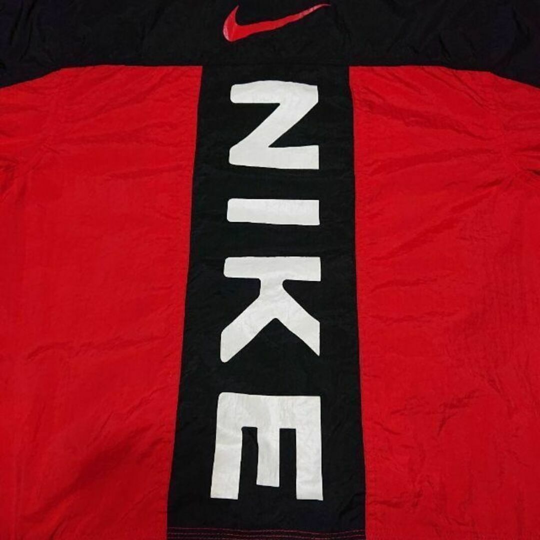 NIKE(ナイキ)の90s NIKE 白タグ ナイロンジャケット ビッグプリント 古着 ブルズカラー メンズのジャケット/アウター(ナイロンジャケット)の商品写真