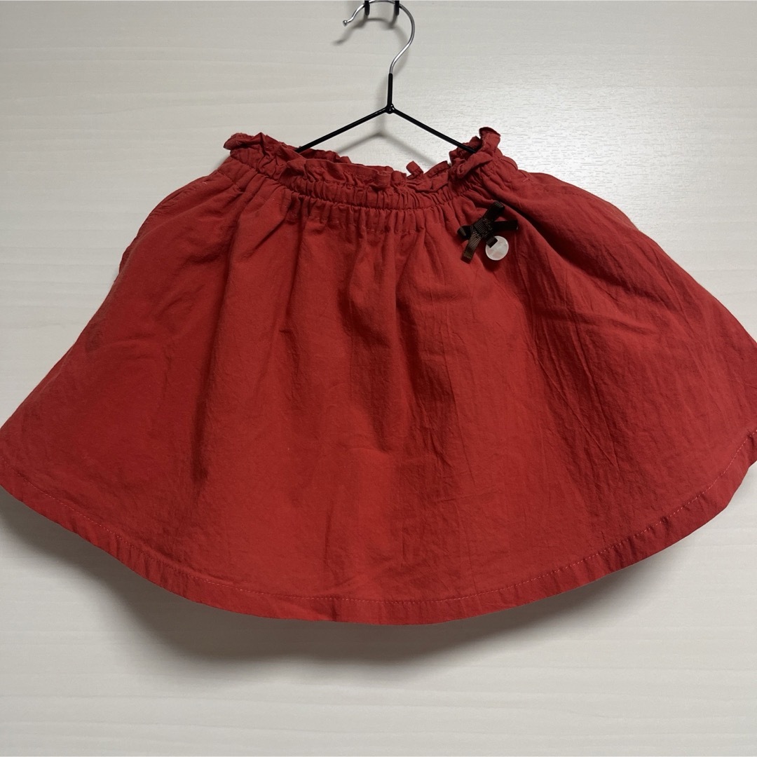 petit main - くすみレッドスカート 90の通販 by 向日葵｜プティマイン