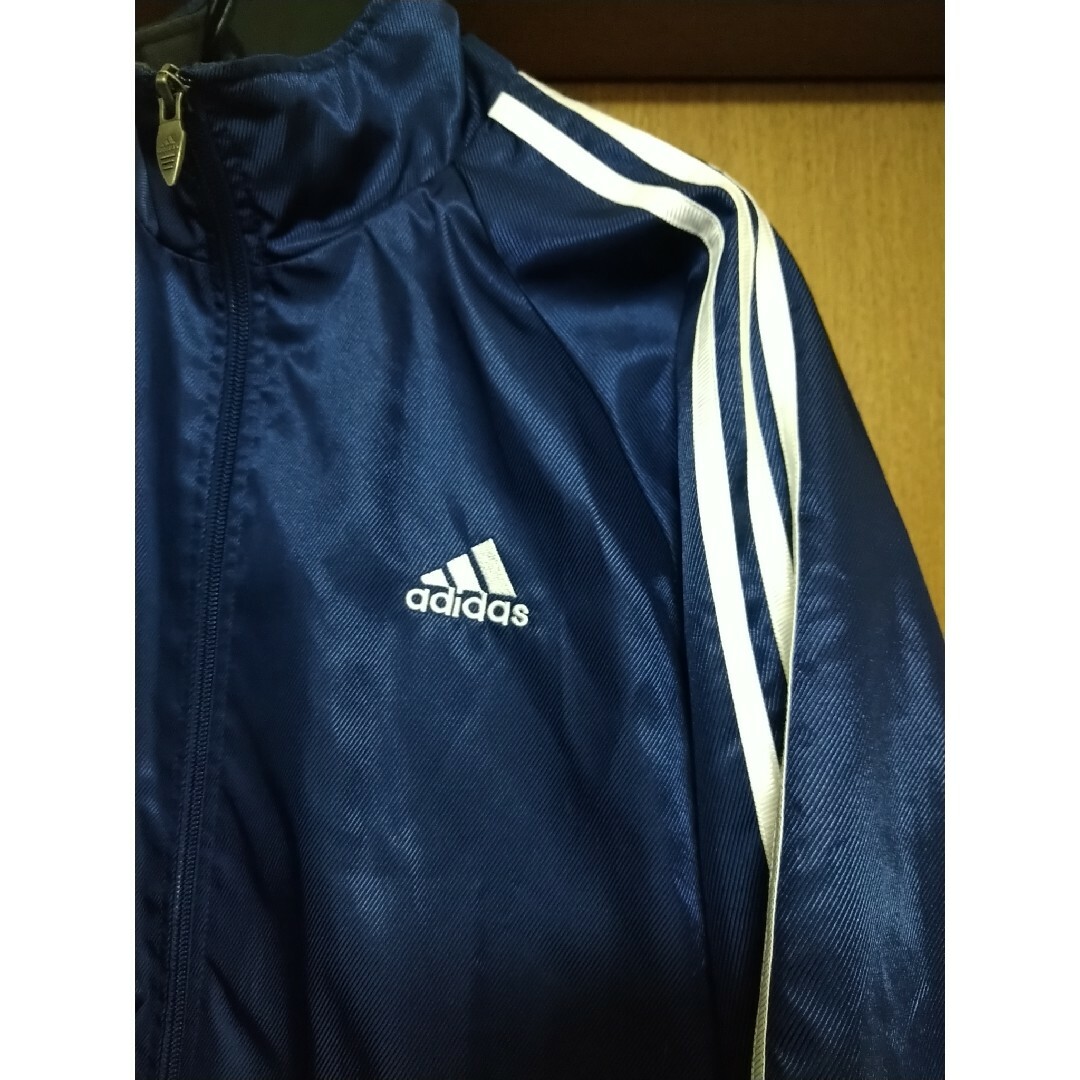 adidas(アディダス)のM0212 アディダス　adidas　ウインドブレーカー　紺色　3本ライン　LL メンズのジャケット/アウター(ナイロンジャケット)の商品写真