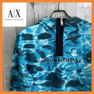 アルマーニエクスチェンジ(ARMANI EXCHANGE)の【新品】アルマーニエクスチェンジARMANI フーディー　パーカー　水面柄　青(パーカー)