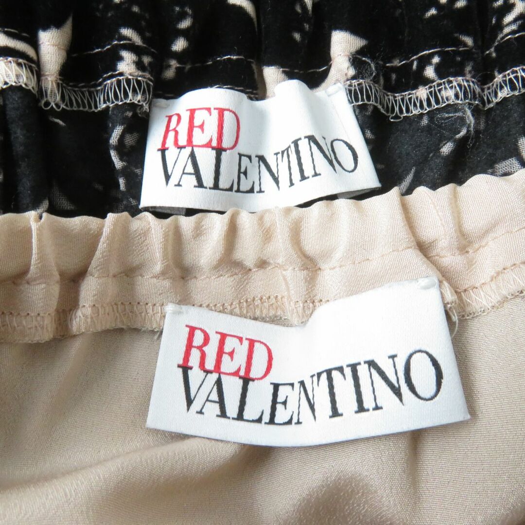 RED VALENTINO(レッドヴァレンティノ)の美品☆正規品 RED VALENTINO レッドヴァレンティノ シルク100％ ベロアレースプリント ミニ丈 フレアスカート 黒×ピンク 38 インナー付き レディースのスカート(ミニスカート)の商品写真