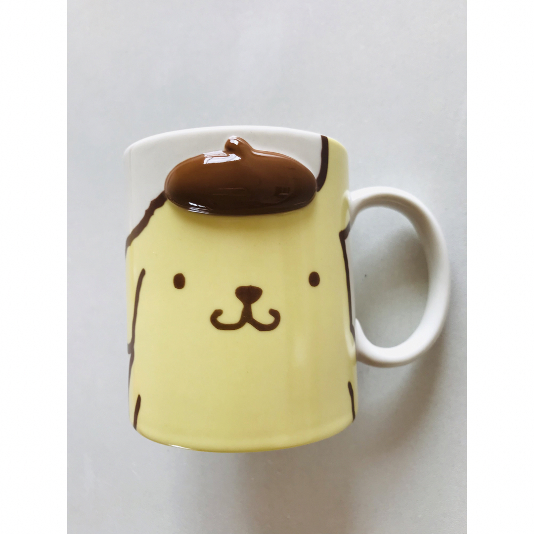 サンリオ(サンリオ)のポムポムプリン　ぷっくりマグカップ　マグカップ　カップ　コップ　グラス　食器 キッズ/ベビー/マタニティの授乳/お食事用品(マグカップ)の商品写真