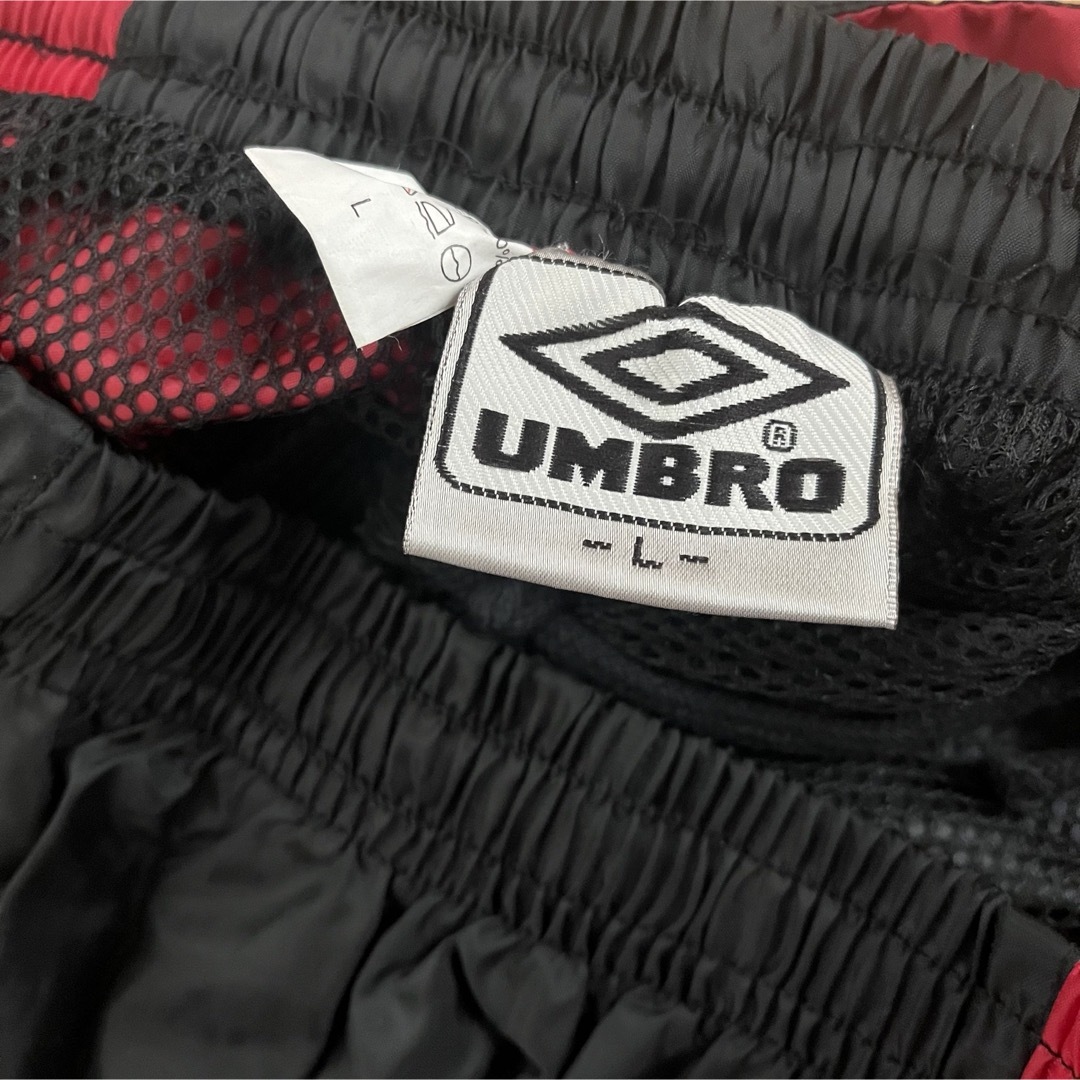 UMBRO(アンブロ)の激レア 90’s UMBRO トラックパンツ 刺繍ロゴ テック パンク メンズのパンツ(その他)の商品写真