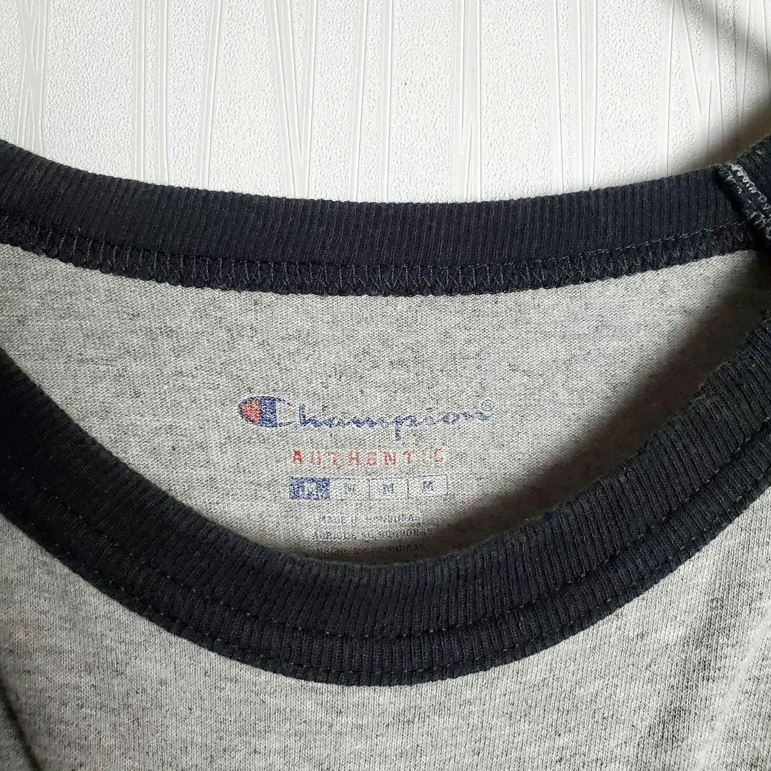 Champion(チャンピオン)のChampion ラグランTシャツ グレー 灰黒 英字 7分袖 ゆるだぼ 古着② メンズのトップス(Tシャツ/カットソー(半袖/袖なし))の商品写真