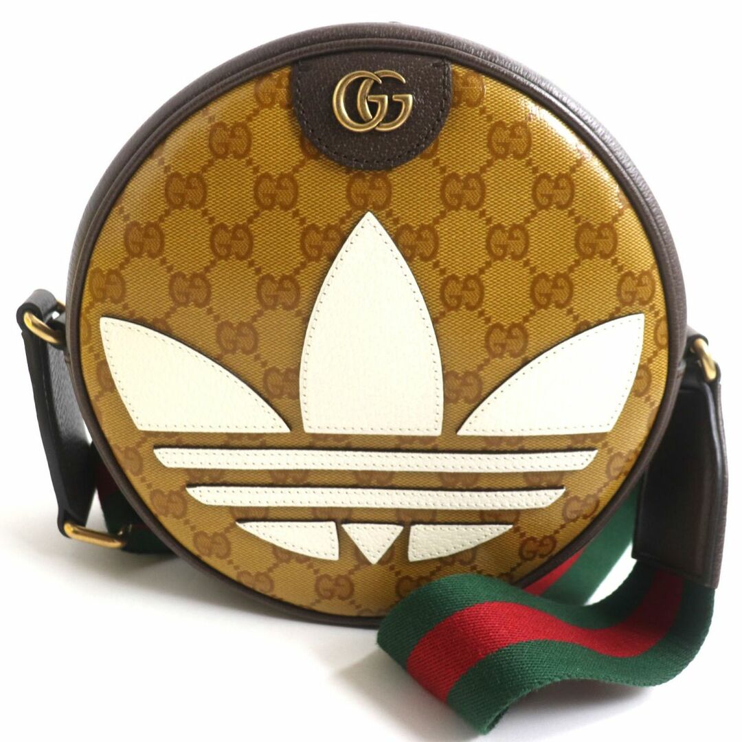 Gucci(グッチ)の未使用品▼グッチ×アディダス コラボ 702640 オフィディア スモール GGクリスタル トレフォイルパッチ ショルダーバッグ 茶×白 伊製 箱付 メンズのバッグ(ショルダーバッグ)の商品写真