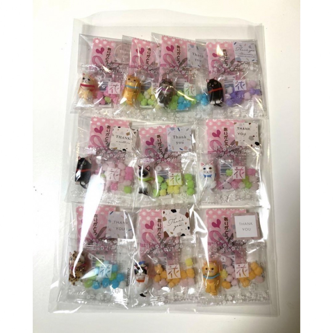 プチギフト　猫　花セット　10袋　ホワイトデー　卒業　ばら撒き　お菓子　002 食品/飲料/酒の食品(菓子/デザート)の商品写真