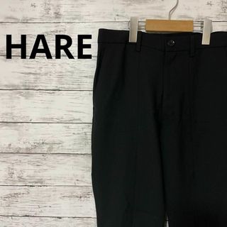 ハレ(HARE)のHARE センタージップフレアパンツ スラックス 黒 人気 お洒落 流行(スラックス)