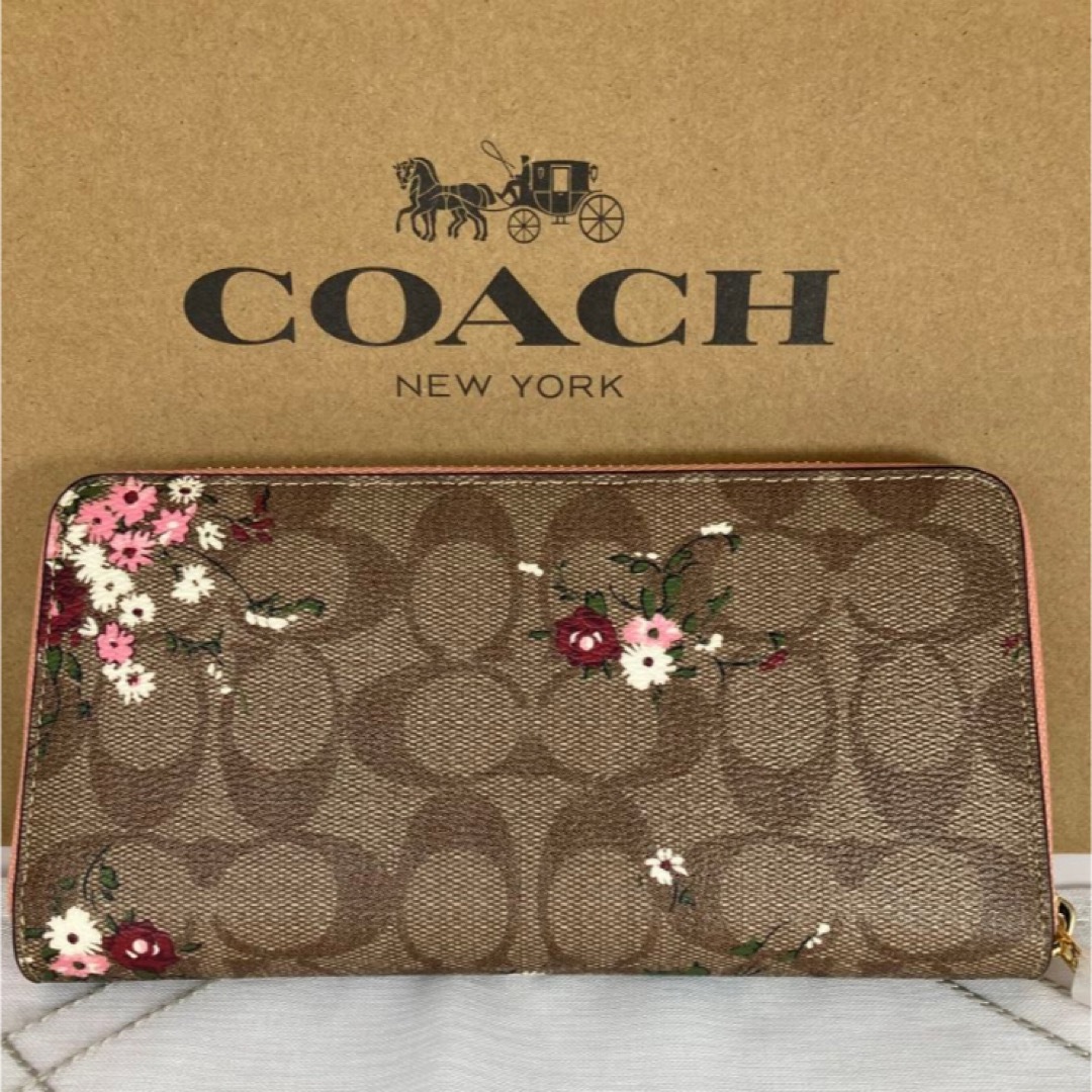 COACH(コーチ)の新品　コーチ　長財布　ブラウン　花柄　ラウンドファスナー　小銭入れ有り　 レディースのファッション小物(財布)の商品写真