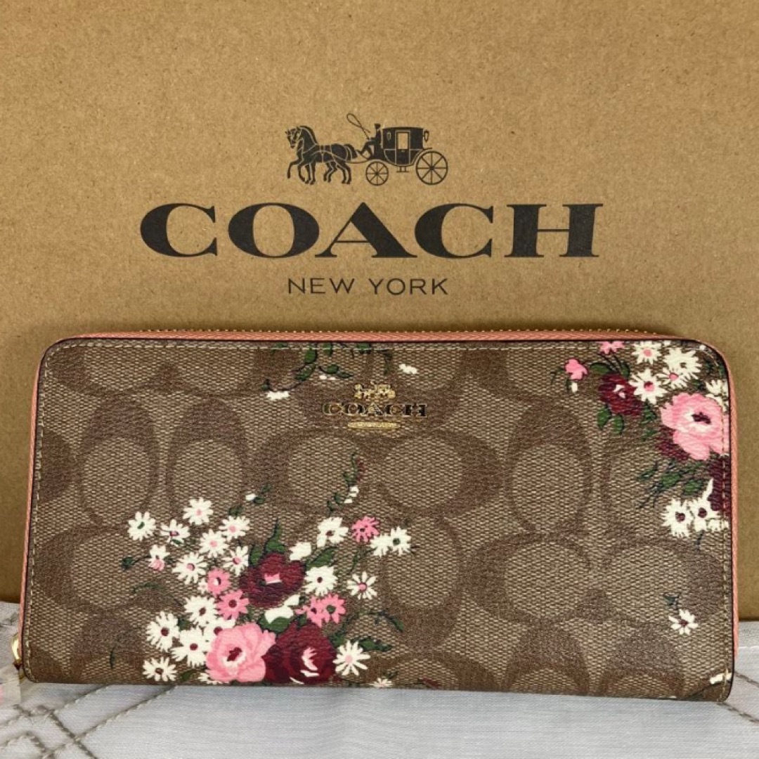 COACH(コーチ)の新品　コーチ　長財布　ブラウン　花柄　ラウンドファスナー　小銭入れ有り　 レディースのファッション小物(財布)の商品写真