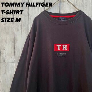 トミーヒルフィガー(TOMMY HILFIGER)のアメリカ古着 トミーヒルフィガー　長袖センター刺繍ロゴTシャツ　M黒ユニセックス(その他)