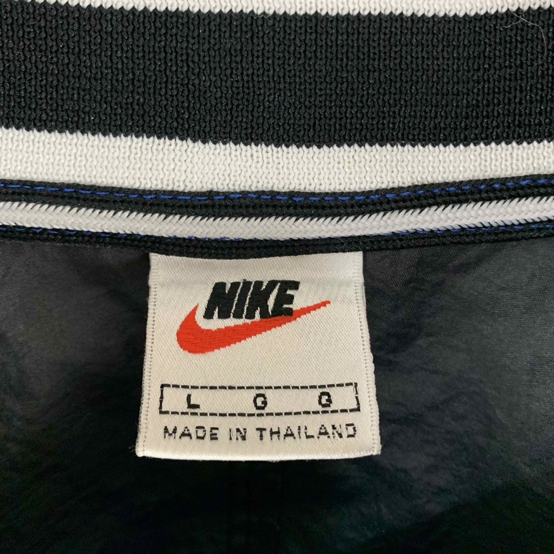 NIKE(ナイキ)の【希少】ナイキ　90s　ツートン　刺繍ロゴ　スウォッシュ　青　ナイロンジャケット メンズのジャケット/アウター(ナイロンジャケット)の商品写真