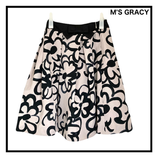 エムズグレイシー(M'S GRACY)の新品タグ付き　エムズグレイシー　ひざ丈スカート　花柄　フレア　リボン付き　38(ひざ丈スカート)