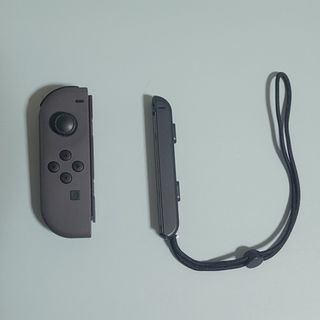 ニンテンドースイッチ(Nintendo Switch)の【中古】純正Joy-Con グレー L ストラップ付き【ジャンク】(その他)