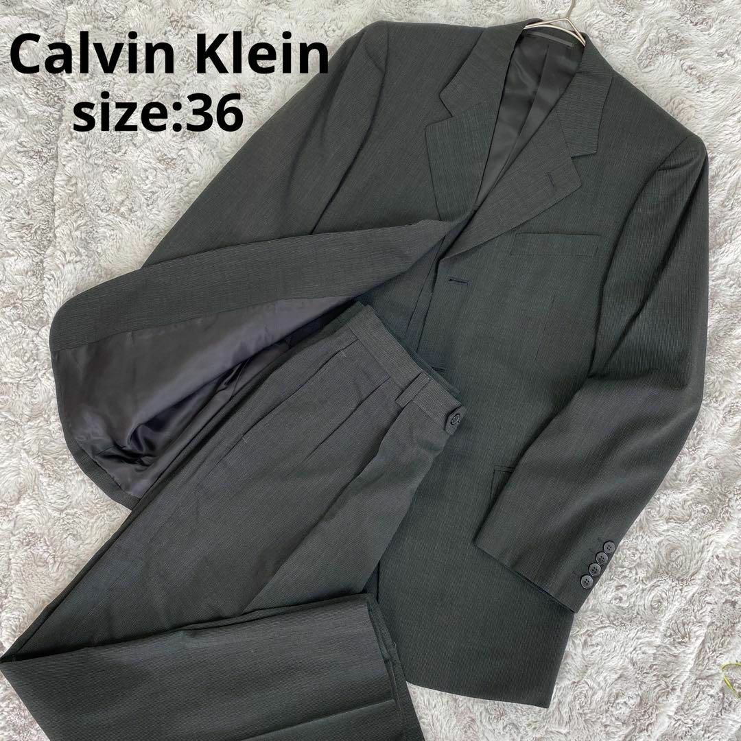 Calvin Klein(カルバンクライン)のカルバンクライン　スーツ　ビジネス　結婚式　セットアップ　 ブラック　36 メンズのスーツ(セットアップ)の商品写真