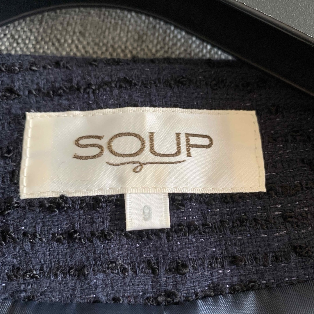 SOUP(スープ)の美品 SOUP 9 ノーカラージャケット ネイビー コサージュ付き レディースのジャケット/アウター(ノーカラージャケット)の商品写真