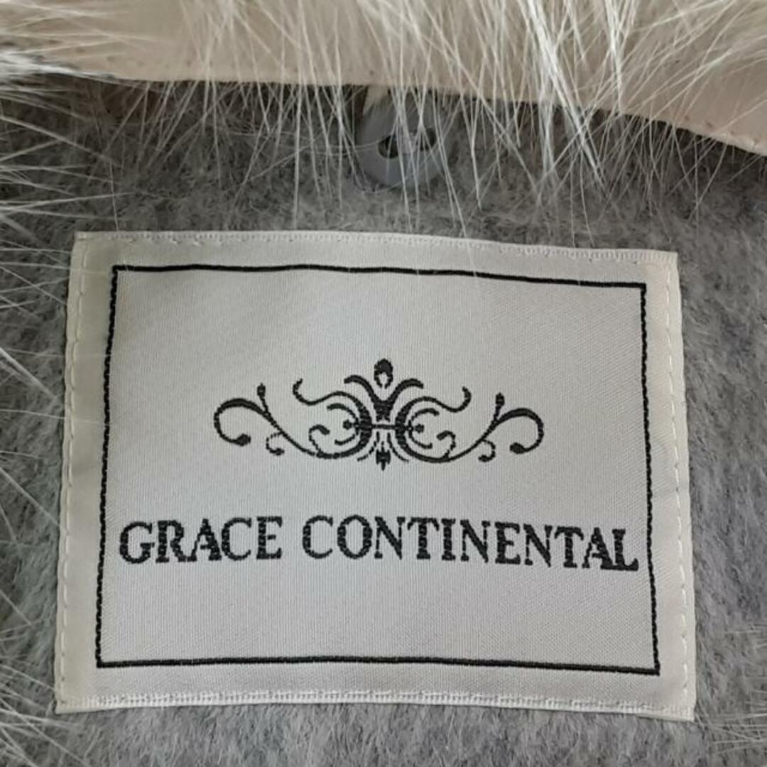 GRACE CONTINENTAL(グレースコンチネンタル)のGRACE CONTINENTAL(グレースコンチネンタル) コート サイズ36 S レディース美品  - グレー×アイボリー 長袖/フォックスファー/ビジュー/冬 レディースのジャケット/アウター(その他)の商品写真