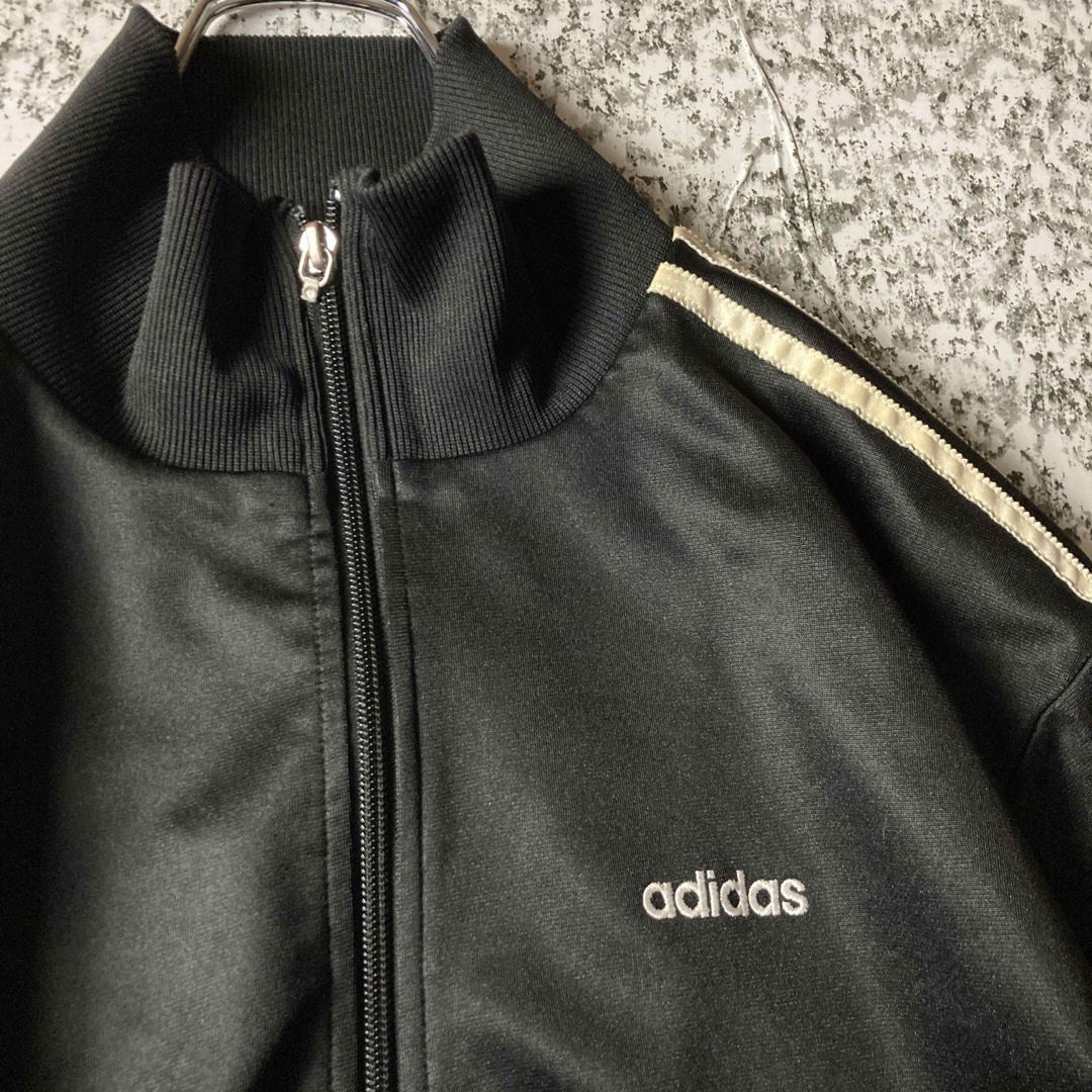 adidas(アディダス)の【グッドレギュラー】アディダス　ファイヤーバード　トラックジャケット　ブラック メンズのトップス(ジャージ)の商品写真