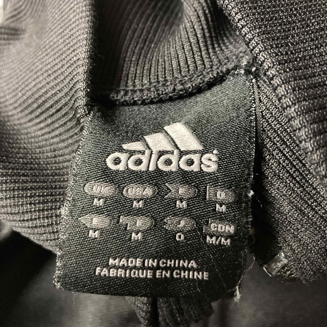 adidas(アディダス)の【グッドレギュラー】アディダス　ファイヤーバード　トラックジャケット　ブラック メンズのトップス(ジャージ)の商品写真