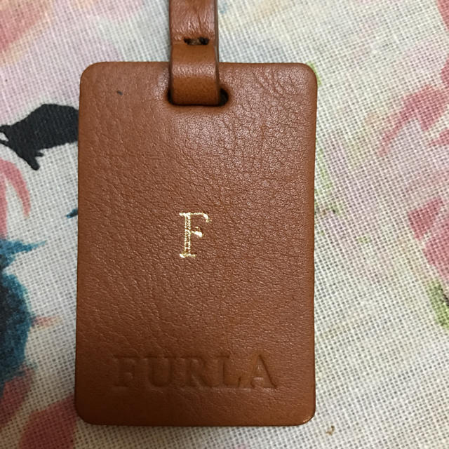 Furla(フルラ)のストラップ スマホ/家電/カメラのスマホアクセサリー(ストラップ/イヤホンジャック)の商品写真