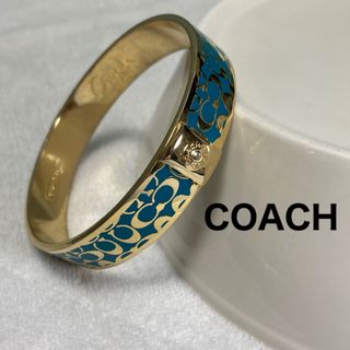 コーチ(COACH)のCOACHコーチ　ゴールド　ブルー　シグネチャーバングル/ブレスレット　刻印あり(ブレスレット/バングル)