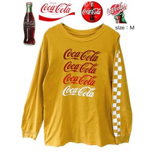 コカコーラ(コカ・コーラ)のCoca-Cola　コカ・コーラ　長袖Ｔシャツ　M　黄色　USA古着(Tシャツ/カットソー(七分/長袖))