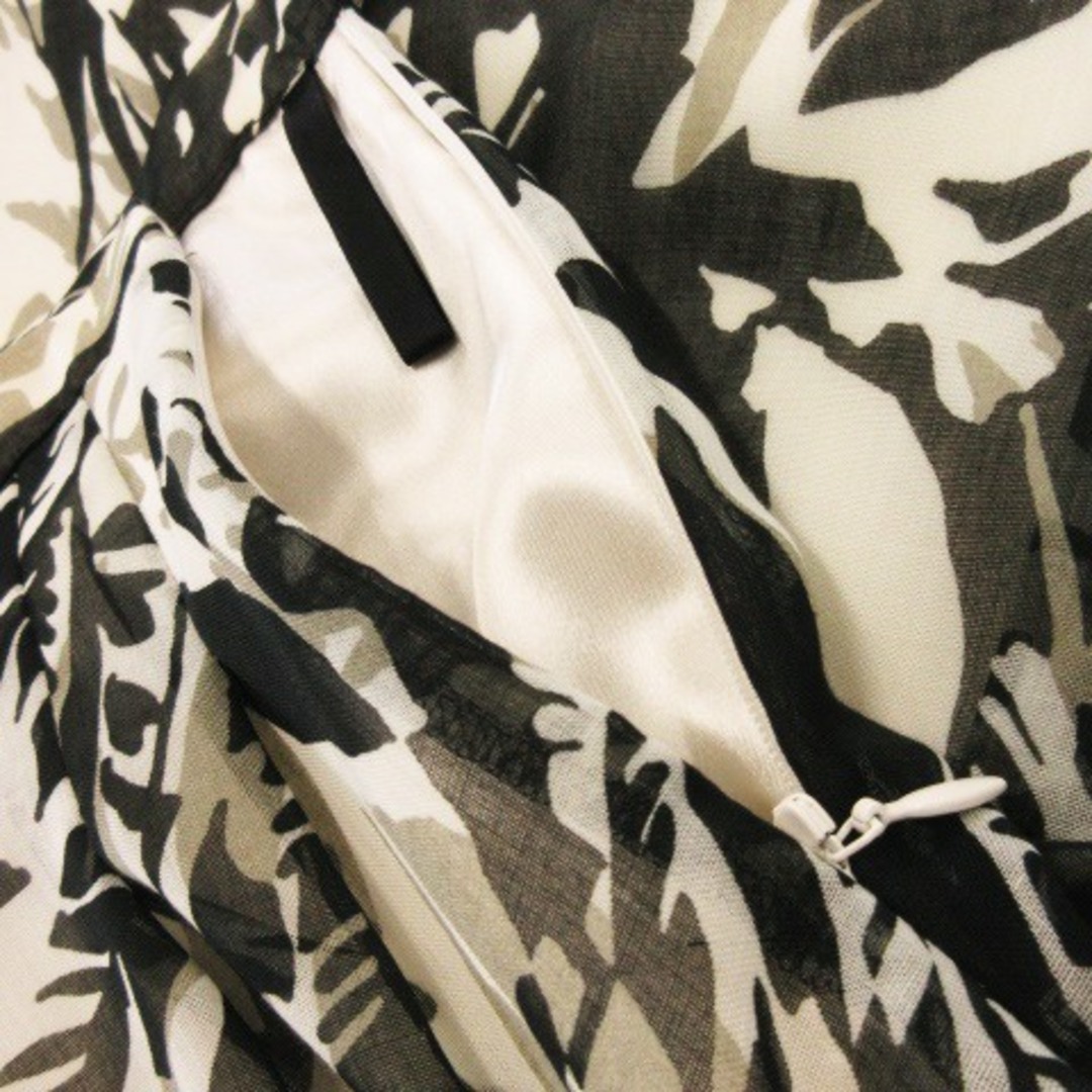 COUP DE CHANCE(クードシャンス)のクードシャンス スカート フレア ひざ丈 シアー エアリー 総柄 36 グレー レディースのスカート(ひざ丈スカート)の商品写真