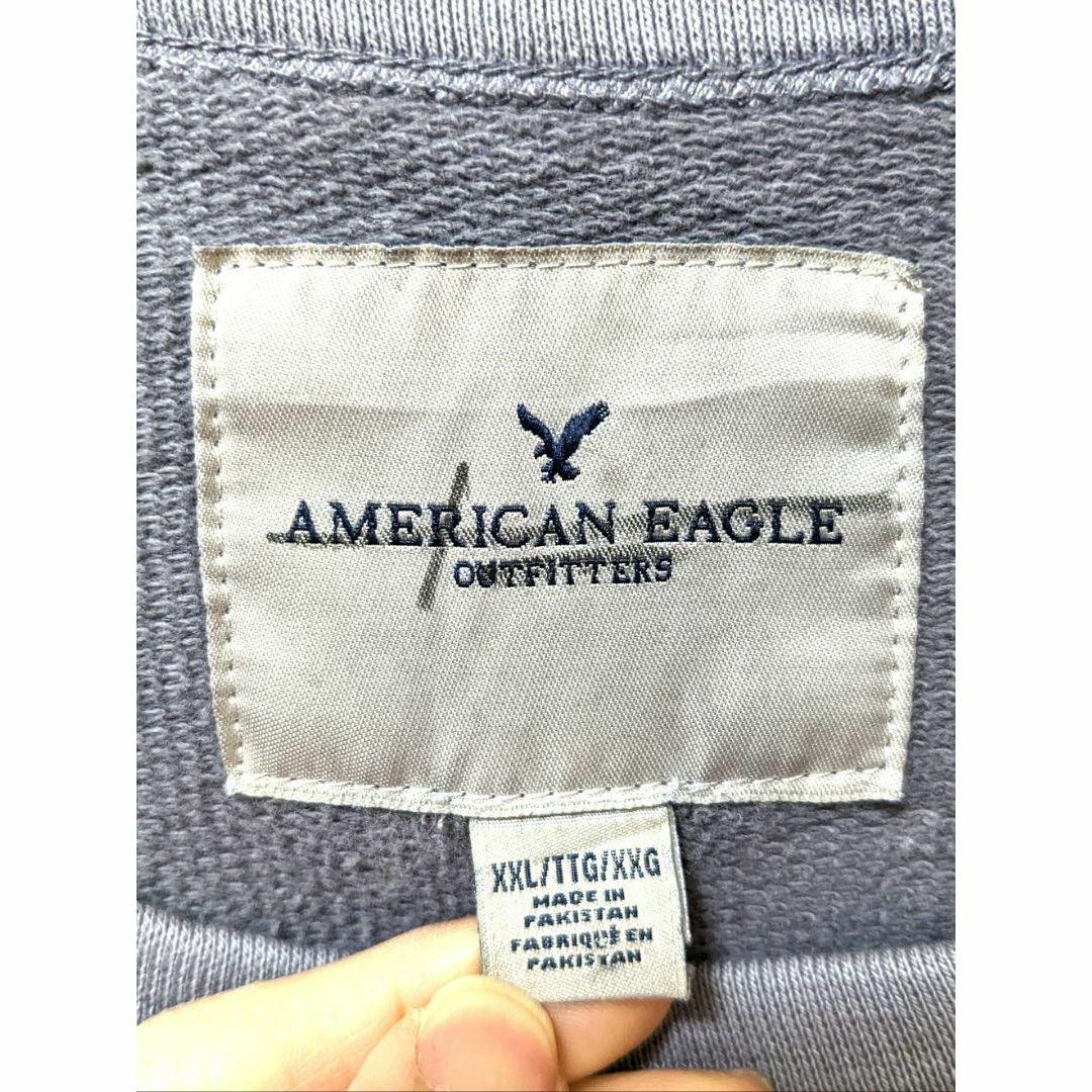 American Eagle(アメリカンイーグル)のアメリカンイーグルダメージスウェットトレーナーグレー灰色2XL古着 その他のその他(その他)の商品写真