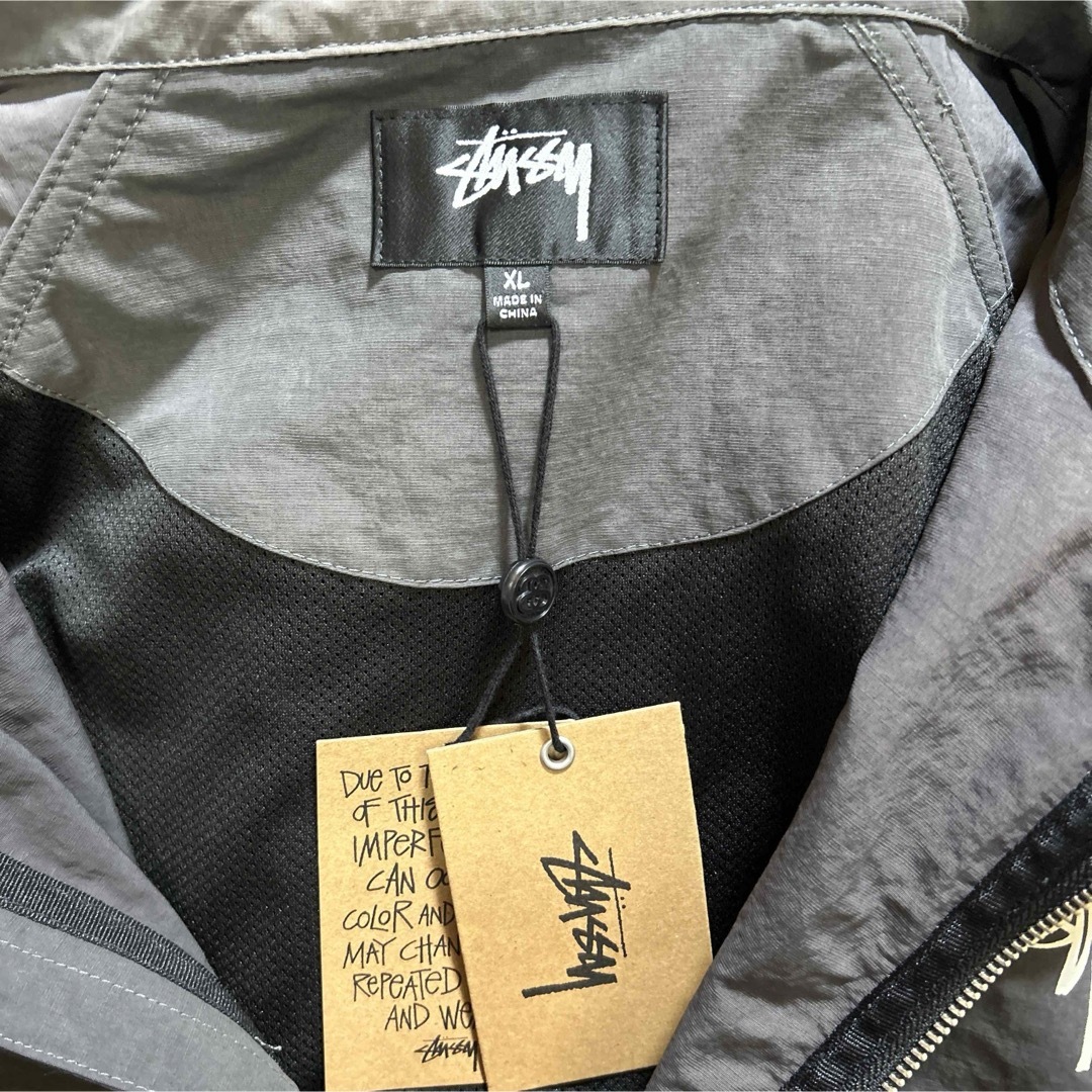 STUSSY(ステューシー)の"VWH"様　　　　　STUSSY BEACH SHELL WAVE DYE  メンズのジャケット/アウター(ナイロンジャケット)の商品写真