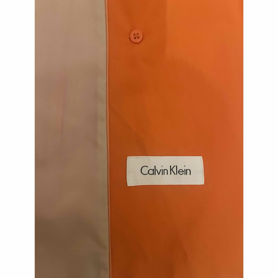 Calvin Klein(カルバンクライン)のCalvin Klein  カルバンクライン オレンジ トレンチコート レディースのジャケット/アウター(トレンチコート)の商品写真