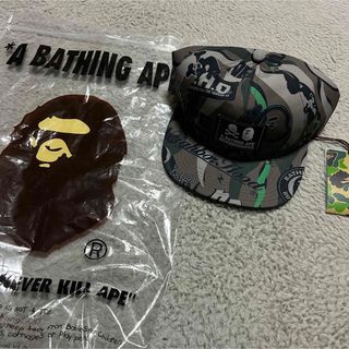 アベイシングエイプ(A BATHING APE)のAPE BAPE KAWS NEIGHBORHOOD CAP キャップ　CAMO(キャップ)