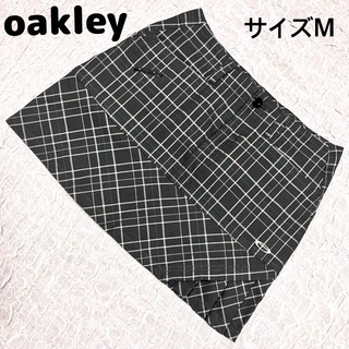 オークリー(Oakley)のoakley オークリー　ゴルフ　チェックスカート　サイズM グリーン(ウエア)