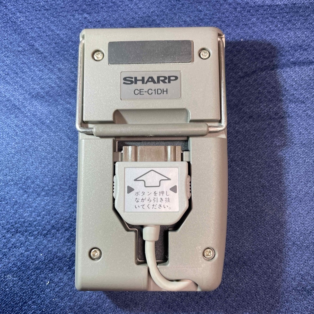 SHARP(シャープ)の【ジャンク品】シャープ　ザウルス用　携帯電話接続ホルダー スマホ/家電/カメラのPC/タブレット(その他)の商品写真