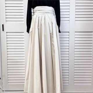 アンドクチュール(And Couture)のAnd Coutureリボン付きロングスカート(ロングスカート)