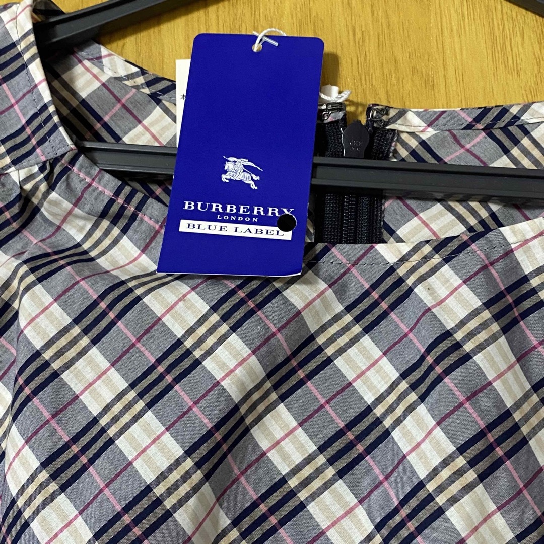 BURBERRY BLUE LABEL(バーバリーブルーレーベル)の【新品タグ付き】バーバリー ブルーレーベル　チェックトップス　36 レディースのトップス(シャツ/ブラウス(半袖/袖なし))の商品写真