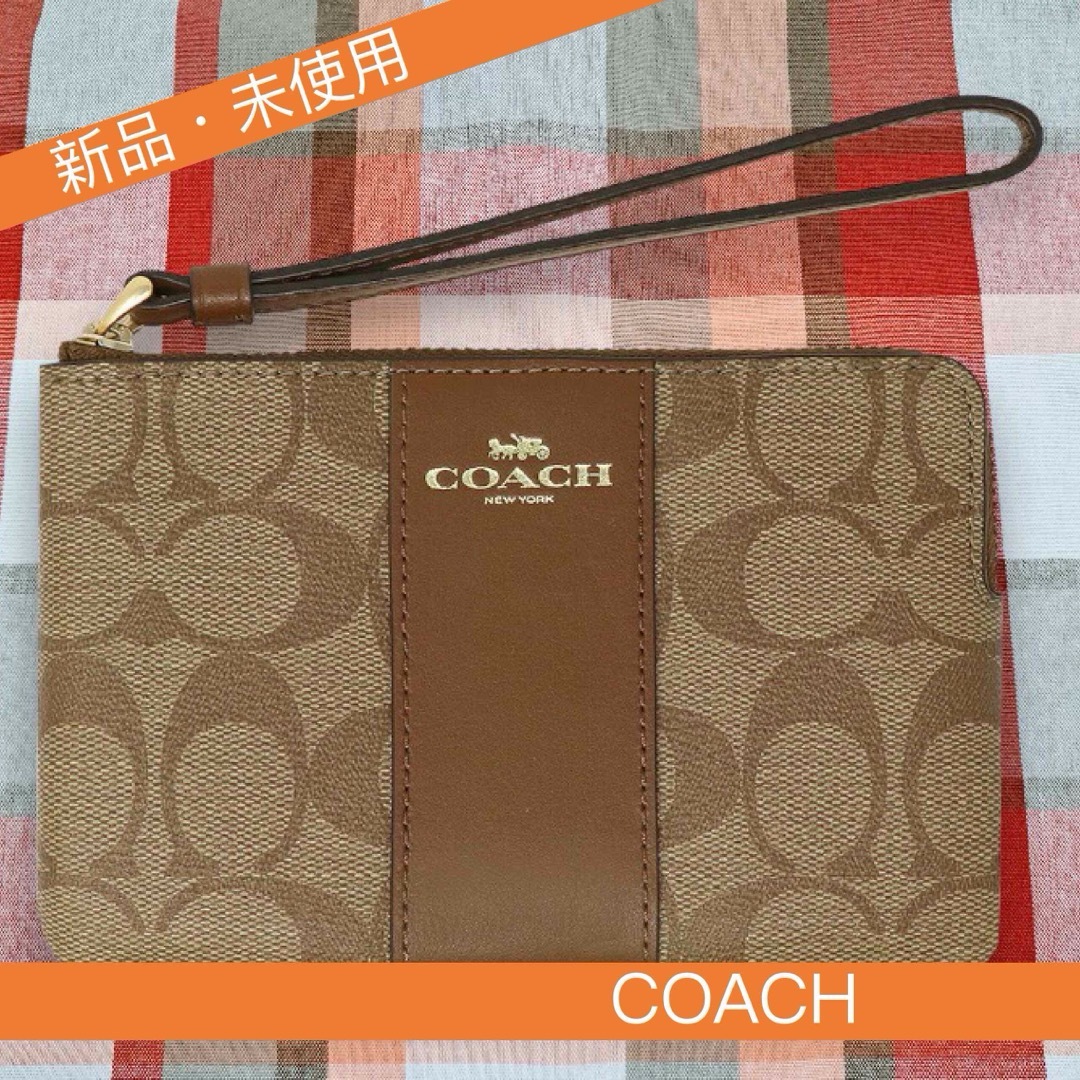 COACH(コーチ)の【新品未使用】コーチ　coach　ポーチ　カーキサドル レディースのファッション小物(ポーチ)の商品写真