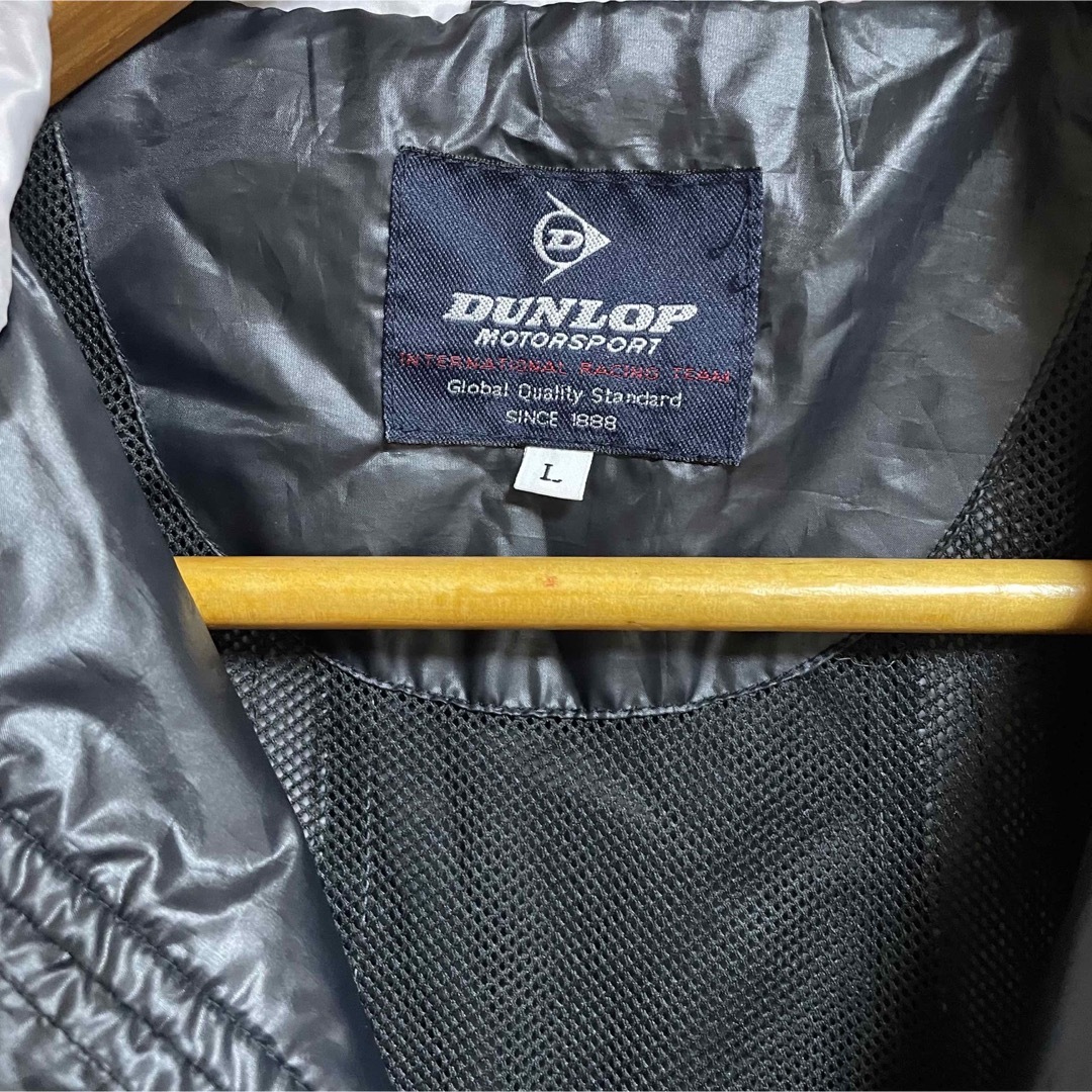 DUNLOP(ダンロップ)のダンロップ　ナイロンブルゾン　Lサイズ　腕ポケットコード用穴有り スポーツ/アウトドアのテニス(ウェア)の商品写真