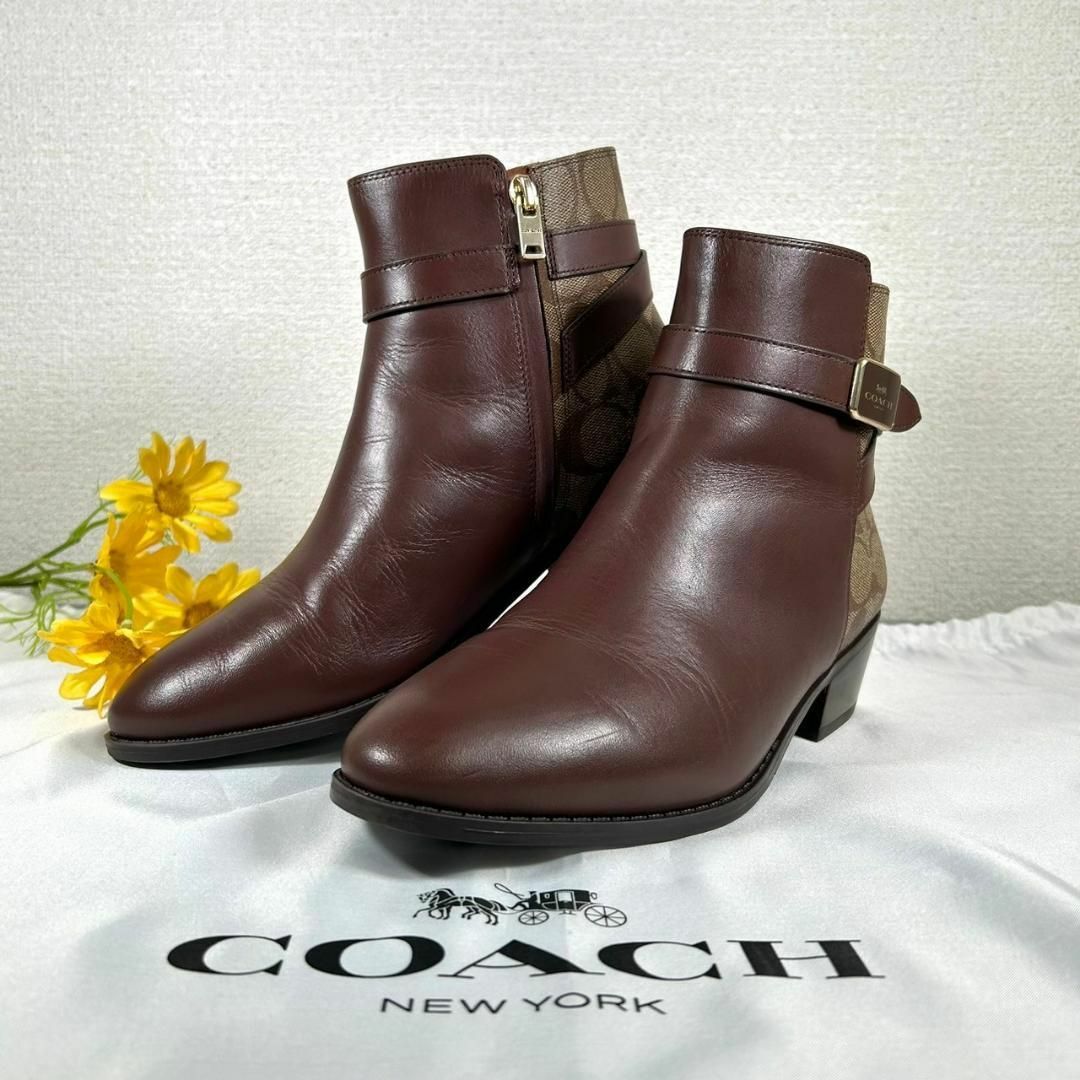 COACH(コーチ)の試着のみ COACH 23.5cm サイドジップ ジョッパーブーツ シグネチャー レディースの靴/シューズ(ブーツ)の商品写真