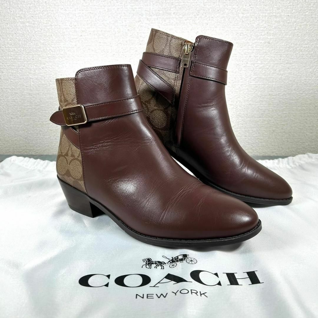 COACH(コーチ)の試着のみ COACH 23.5cm サイドジップ ジョッパーブーツ シグネチャー レディースの靴/シューズ(ブーツ)の商品写真