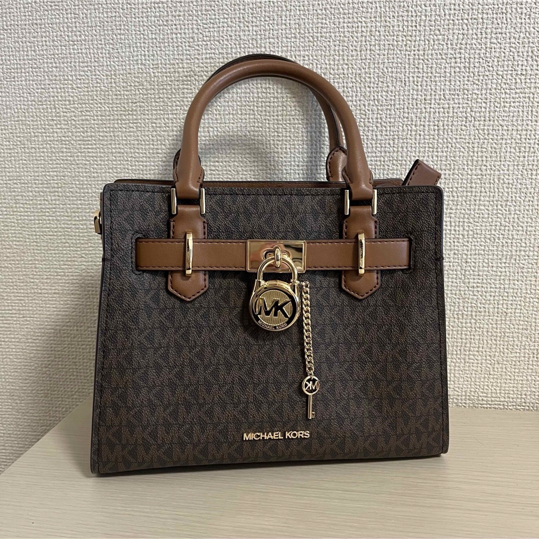 Michael Kors(マイケルコース)のマイケルコース　ショルダーバッグ　サッチェル　スモール　総柄　ブラウン レディースのバッグ(ハンドバッグ)の商品写真