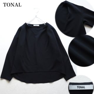 トーナル(TONAL)のTONAL Vネックブラウス タックブラウス ストレッチ ゆったり 黒 38(シャツ/ブラウス(長袖/七分))