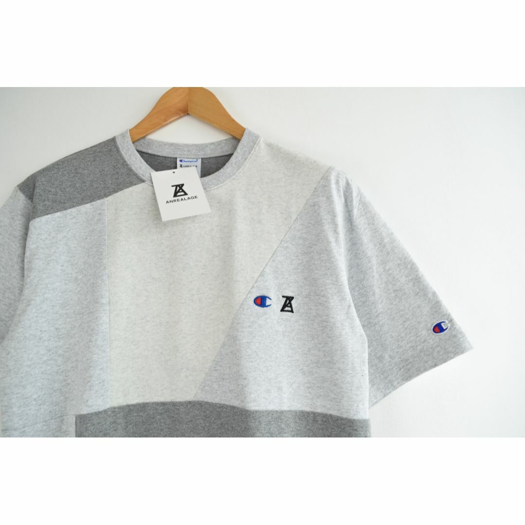 ANREALAGE(アンリアレイジ)の新品 定価1万7600円 Champion × ANREALAGE Tシャツ　L メンズのトップス(Tシャツ/カットソー(半袖/袖なし))の商品写真