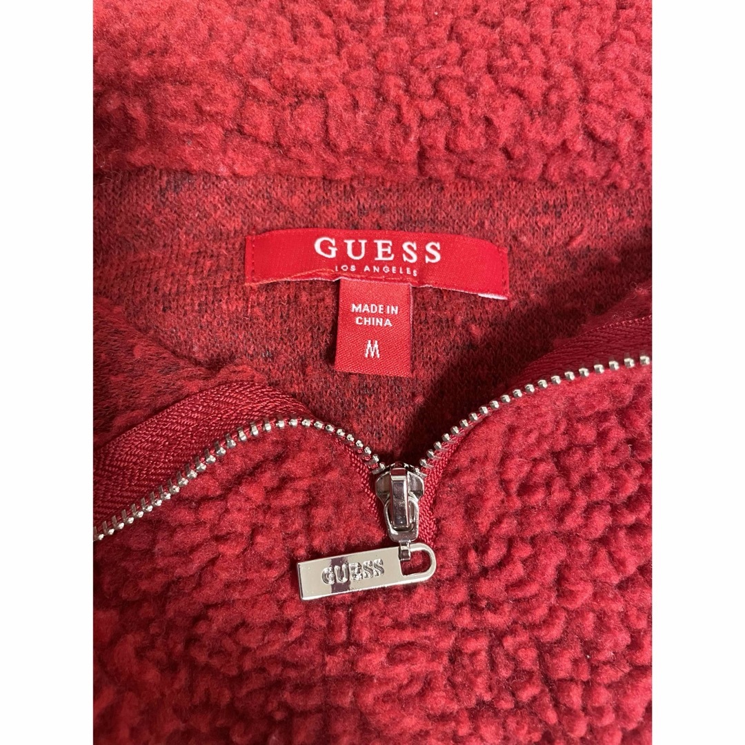 GUESS(ゲス)のゲス　ハーフジップ ボアジャケット M レッド プルオーバー レディース 古着  レディースのトップス(パーカー)の商品写真