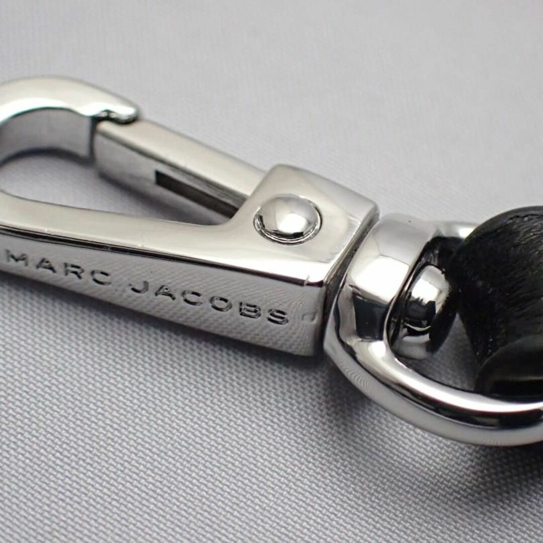 MARC JACOBS(マークジェイコブス)のMARC JACOBS マークジェイコブス ザ トップ ジップ リストレット ウォレット S153L03FA22 フラグメントケース ブラックｘホワイト 中古A 【送料無料】 A-8424【質屋出品】 レディースのファッション小物(コインケース)の商品写真